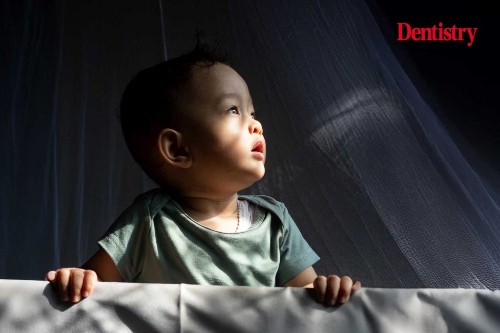 Why is childhood deprivation linked to lower dental attendance?