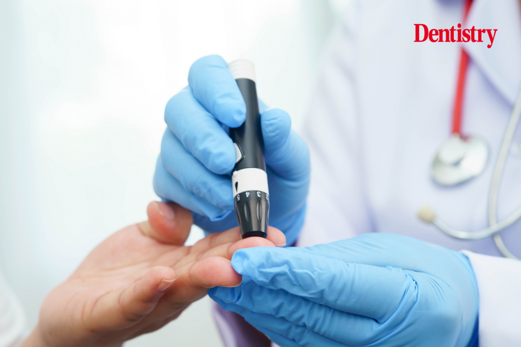 Doctor screens a patient for diabetes. A European white paper backs oral disease screening by medical teams and diabetes risk assessment within dental practices.