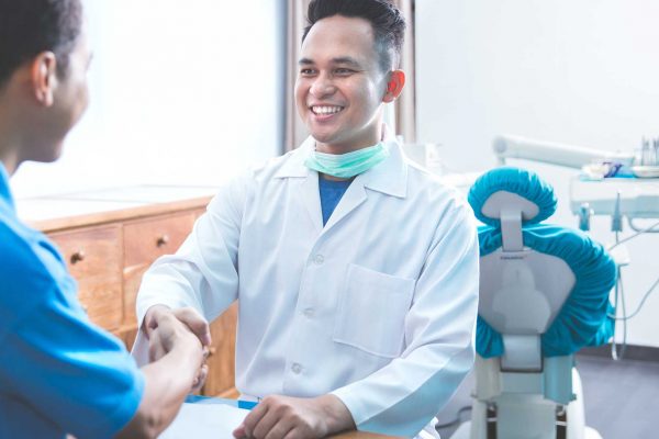 dentist offering ideal patient journey