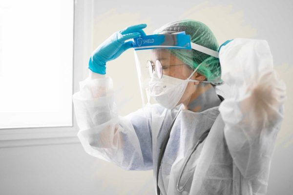 Dentist wearing PPE