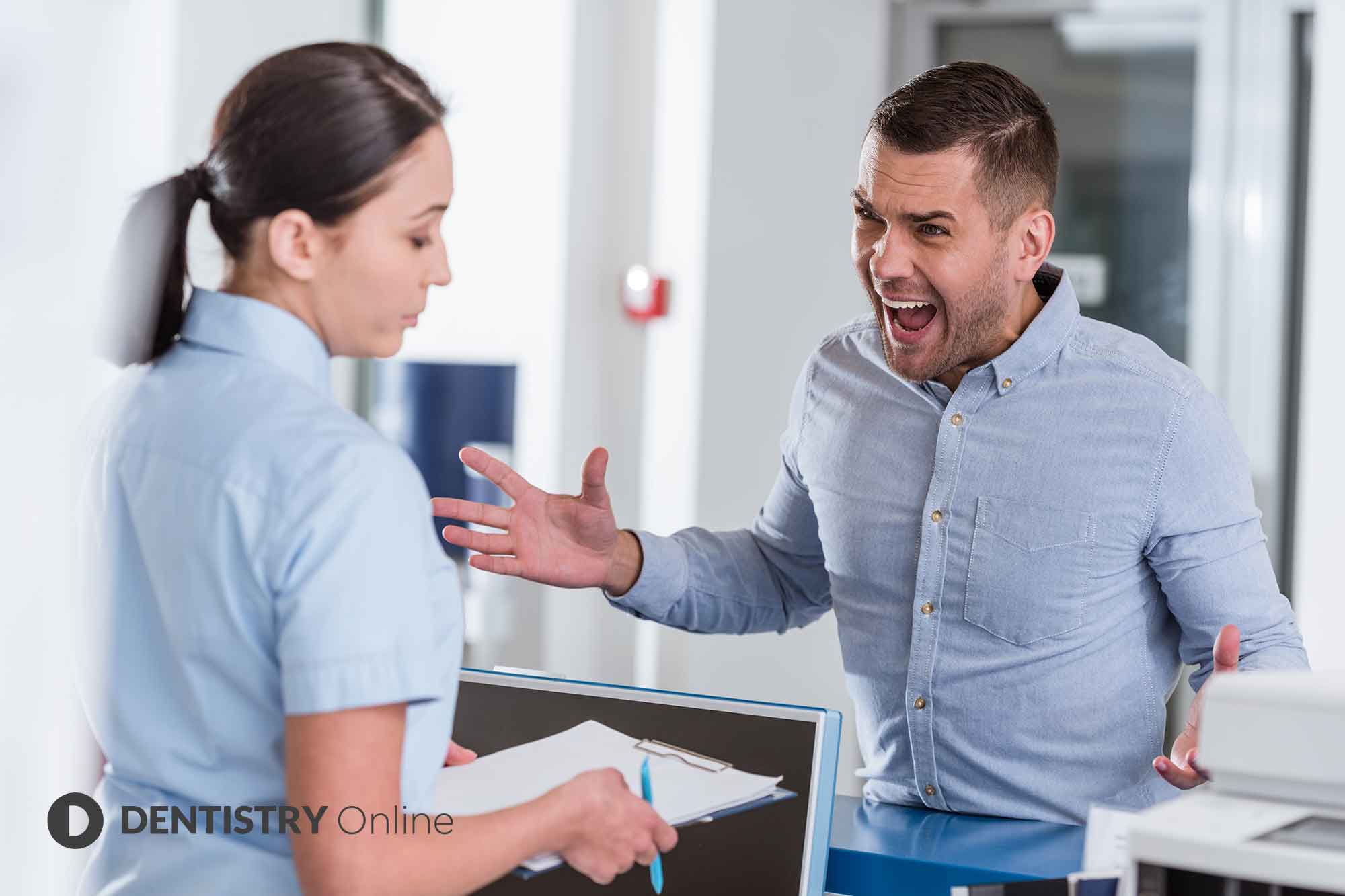 difficult patients talking to receptionist