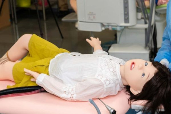 Child robot that vomits and convulses helps train dentists for medical emergenci